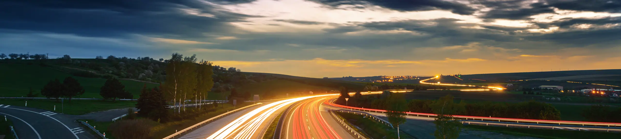 Late night view of a lighted highway Late night view of a lighted highway
