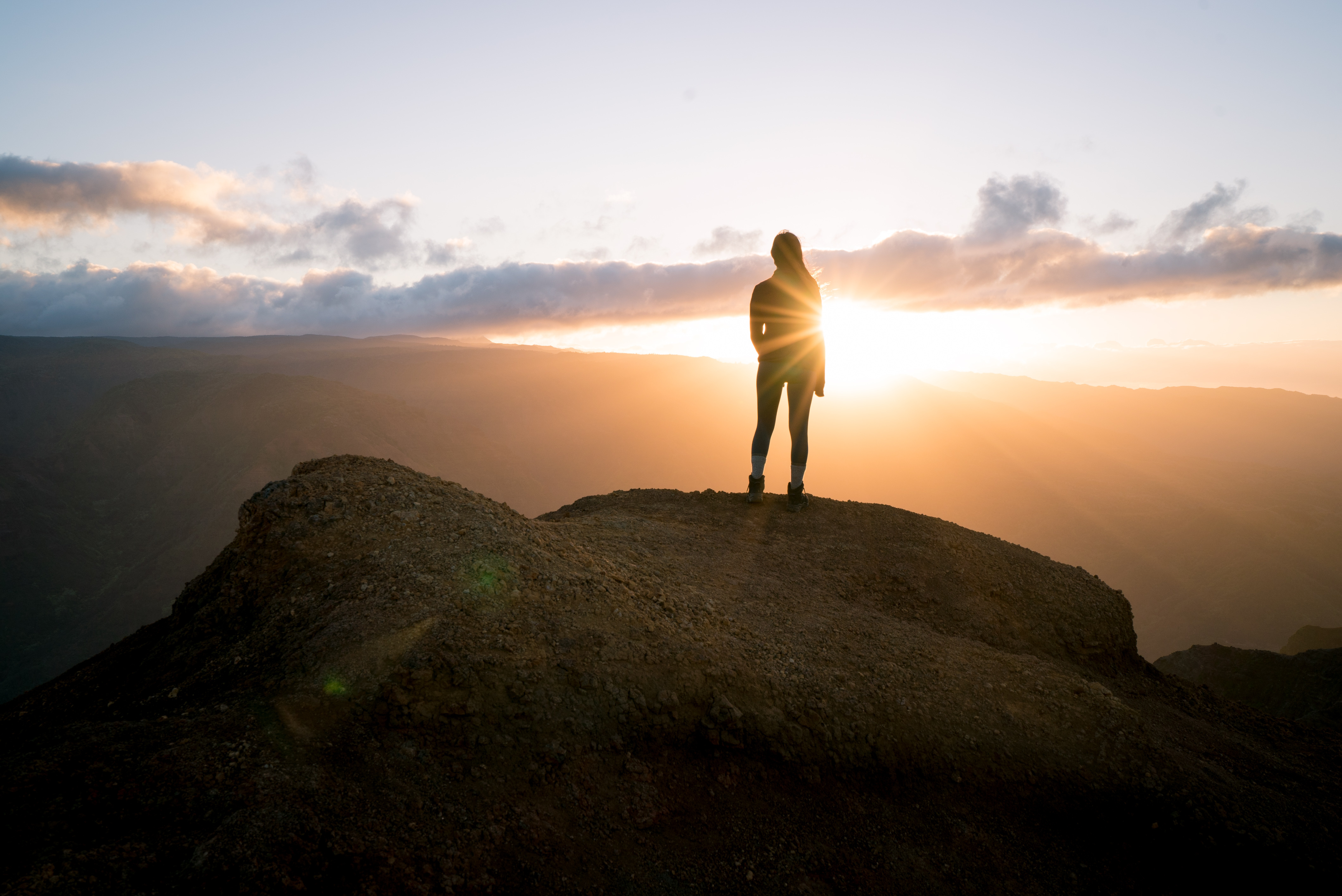 A women reaching the summit