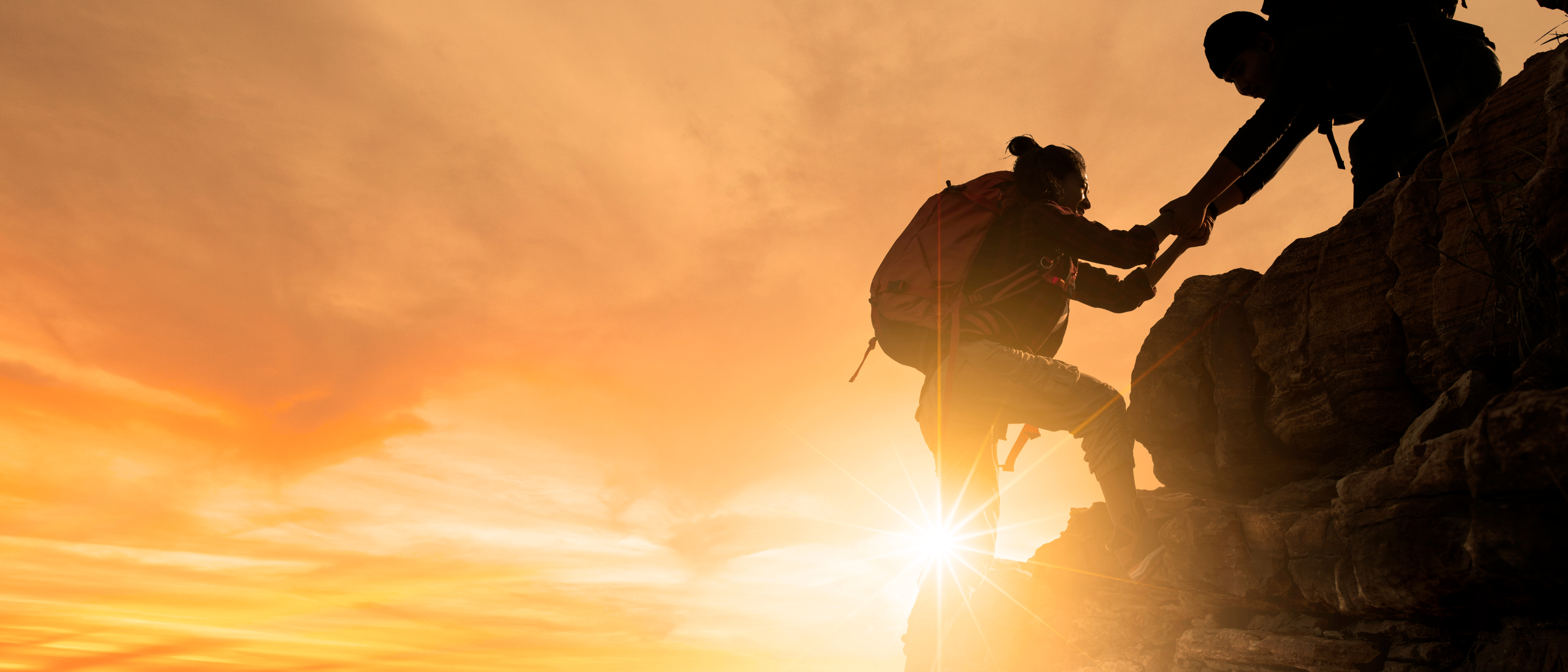 A couple hiking to the top